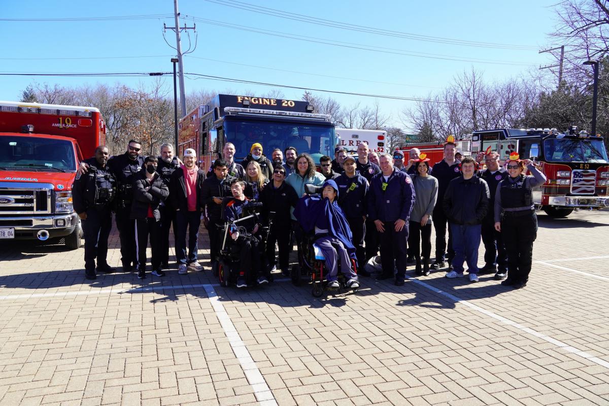Riverwoods Officers Jared Tyunaitis and Al Maciareillo (back row, 2nd and 3rd from left) with First Responders and CEL Members
